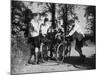Smoking Cyclists-null-Mounted Photographic Print