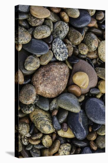 Smooth granite pebbles on beach of Lake Superior, Whitefish Point, Michigan-Adam Jones-Stretched Canvas