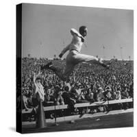 Smu Cheerleader Leaping High into Air at University of Texas Football Game-Loomis Dean-Stretched Canvas