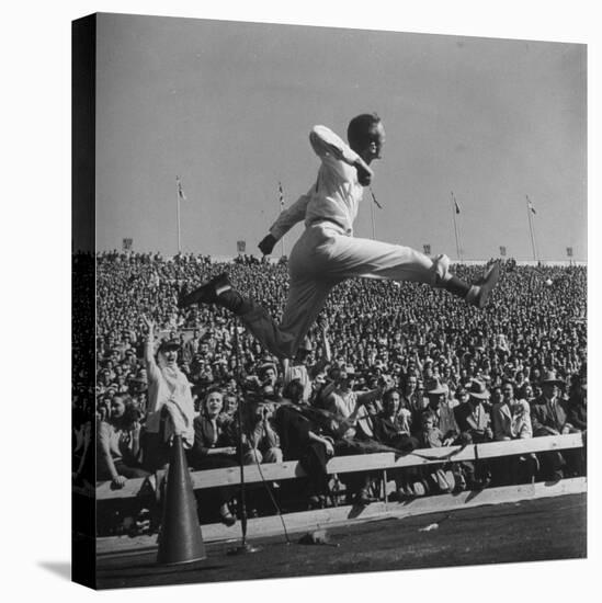 Smu Cheerleader Leaping High into Air at University of Texas Football Game-Loomis Dean-Stretched Canvas