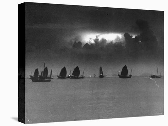 Smugglers' Junks Sailing in Dying Light of Dusk-Jack Birns-Stretched Canvas