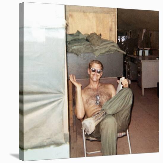 Snapshot of Vietnam War Soldier Relaxing on Base, Ca. 1970-null-Stretched Canvas