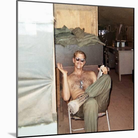 Snapshot of Vietnam War Soldier Relaxing on Base, Ca. 1970-null-Mounted Photographic Print