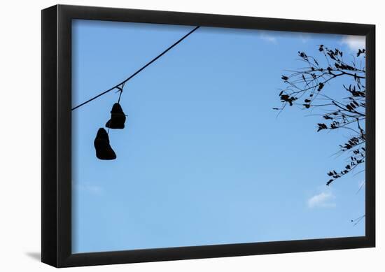 Sneakers on a Wire-null-Framed Poster