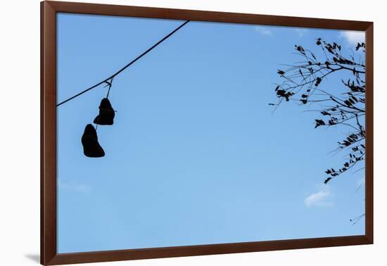 Sneakers on a Wire-null-Framed Photo