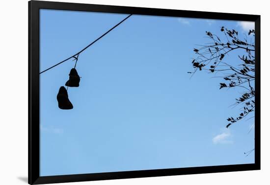 Sneakers on a Wire-null-Framed Photo