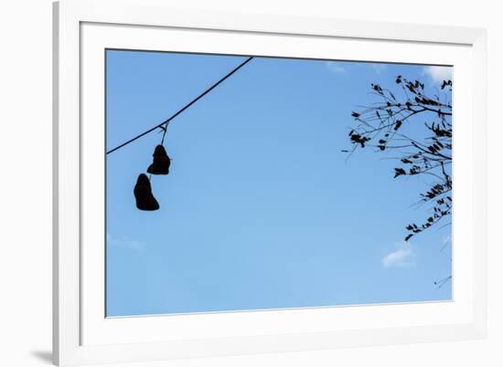 Sneakers on a Wire-null-Framed Photo