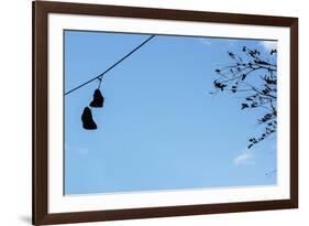 Sneakers on a Wire-null-Framed Photo