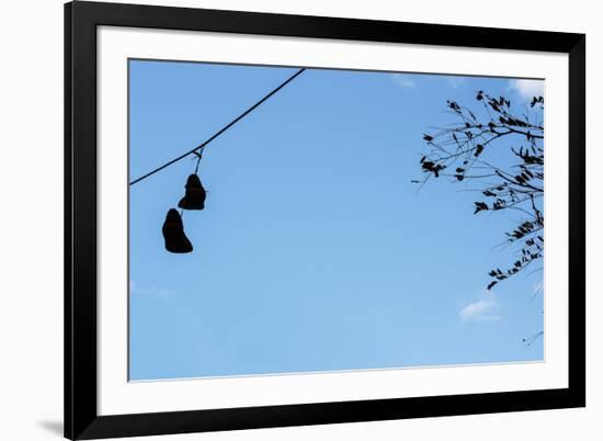 Sneakers on a Wire-null-Framed Photo