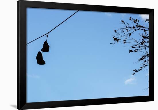 Sneakers on a Wire-null-Framed Photo