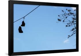 Sneakers on a Wire-null-Framed Photo