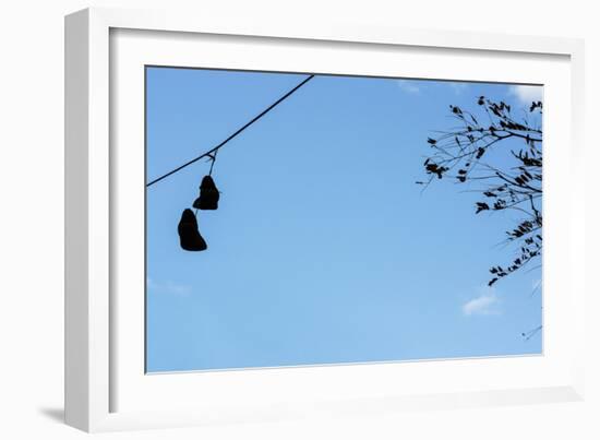 Sneakers on a Wire-null-Framed Photo