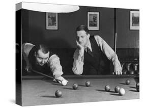 Snooker Player Prepares to Play a Shot as His Partner Looks On-null-Stretched Canvas
