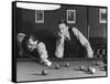 Snooker Player Prepares to Play a Shot as His Partner Looks On-null-Framed Stretched Canvas