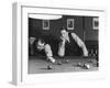 Snooker Player Prepares to Play a Shot as His Partner Looks On-null-Framed Premium Photographic Print