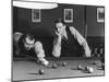 Snooker Player Prepares to Play a Shot as His Partner Looks On-null-Mounted Premium Photographic Print