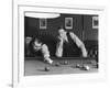 Snooker Player Prepares to Play a Shot as His Partner Looks On-null-Framed Photographic Print