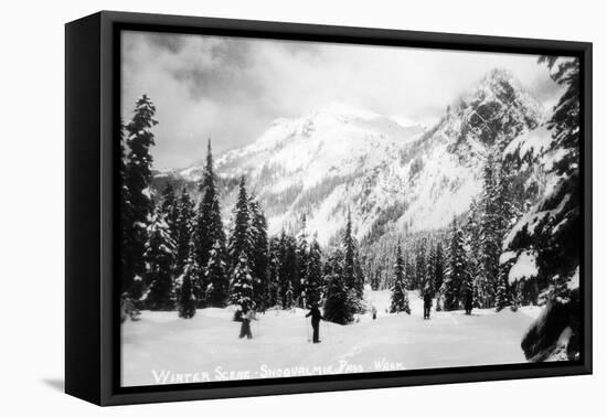 Snoqualmie Pass, Washington, View of Skiers Skiing during the Winter by Mountain-Lantern Press-Framed Stretched Canvas