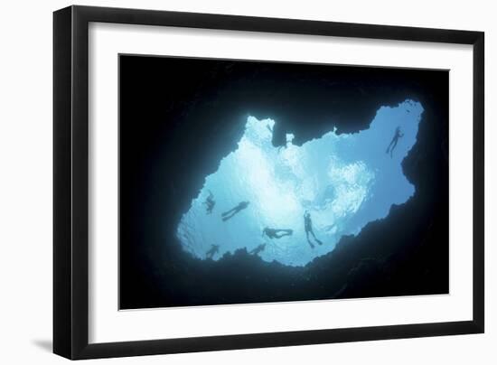 Snorkelers Swim Above a Blue Hole on Palau's Barrier Reef-Stocktrek Images-Framed Photographic Print