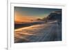 Snow Blows across an Icelandic Road at Sunrise with Mountains Looming in the Distance-Alex Saberi-Framed Photographic Print