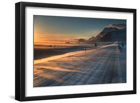 Snow Blows across an Icelandic Road at Sunrise with Mountains Looming in the Distance-Alex Saberi-Framed Photographic Print