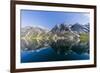 Snow-capped mountains reflected in the calm waters of Nordfjord, deep inside of Melfjord, Norway-Michael Nolan-Framed Photographic Print
