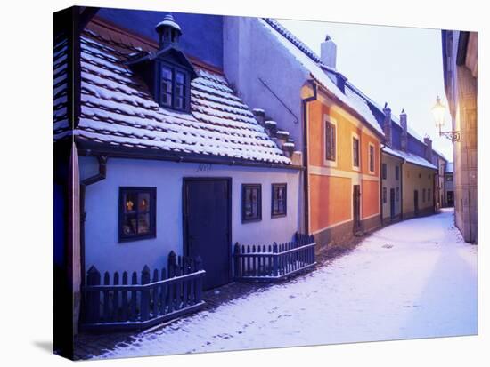 Snow Covered 16th Century Cottages of Golden Lane in Winter Twilight, Hradcany, Czech Republic-Richard Nebesky-Stretched Canvas