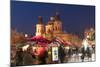 Snow-Covered Christmas Market and Baroque St. Nicholas Church-Richard Nebesky-Mounted Photographic Print