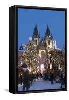 Snow-Covered Christmas Market and Tyn Church, Old Town Square, Prague, Czech Republic, Europe-Richard Nebesky-Framed Stretched Canvas