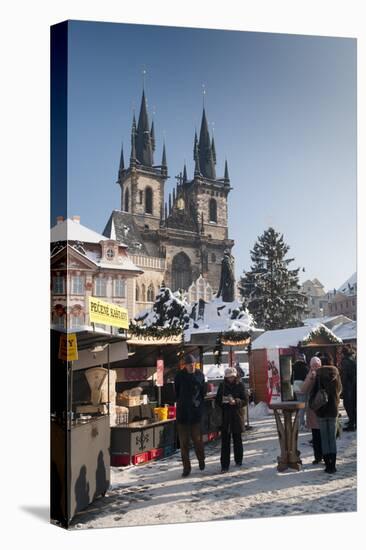 Snow-Covered Christmas Market and Tyn Church, Old Town Square, Prague, Czech Republic, Europe-Richard Nebesky-Stretched Canvas