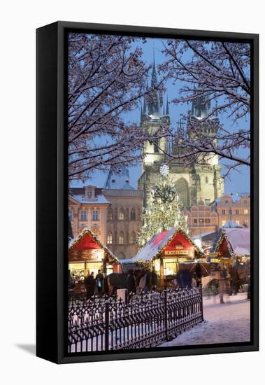 Snow-Covered Christmas Market and Tyn Church, Old Town Square, Prague, Czech Republic, Europe-Richard Nebesky-Framed Stretched Canvas