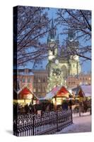 Snow-Covered Christmas Market and Tyn Church, Old Town Square, Prague, Czech Republic, Europe-Richard Nebesky-Stretched Canvas