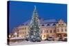 Snow-Covered Christmas Tree and Renaissance Buildings, Jihocesky, Czech Republic, Europe-Richard Nebesky-Stretched Canvas