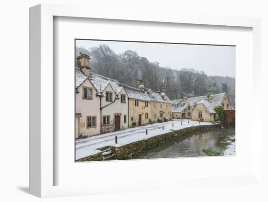 Snow covered houses by By Brook in Castle Combe, Wiltshire, England, United Kingdom, Europe-Paul Porter-Framed Photographic Print