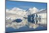 Snow covered island and iceberg with reflection in South Atlantic Ocean, Antarctica-Keren Su-Mounted Photographic Print