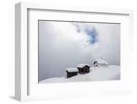 Snow Covered Mountain Huts and Church Surrounded by Low Clouds, Bettmeralp, District of Raron-Roberto Moiola-Framed Photographic Print