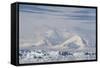 Snow-Covered Mountains Line the Ice Floes in Penola Strait, Antarctica, Polar Regions-Michael Nolan-Framed Stretched Canvas