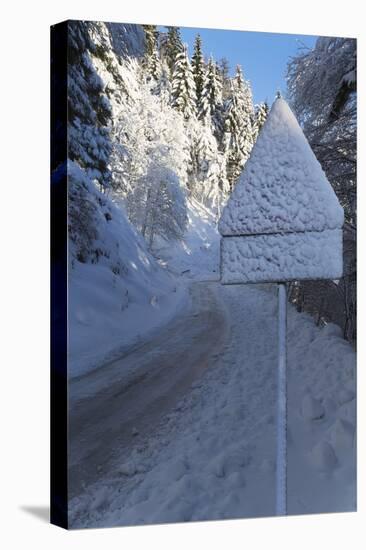 Snow-Covered Road Sign in the Italian Alps in Winter, Aosta Valley, Italy, Europe-Angelo-Stretched Canvas