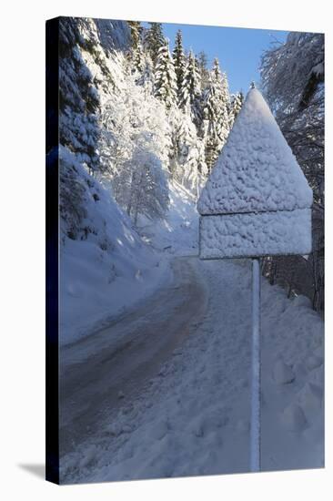 Snow-Covered Road Sign in the Italian Alps in Winter, Aosta Valley, Italy, Europe-Angelo-Stretched Canvas