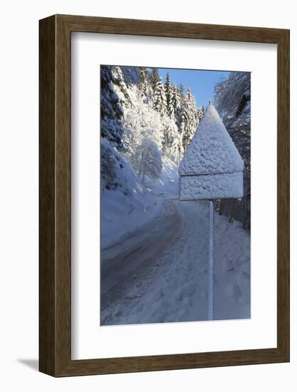 Snow-Covered Road Sign in the Italian Alps in Winter, Aosta Valley, Italy, Europe-Angelo-Framed Photographic Print