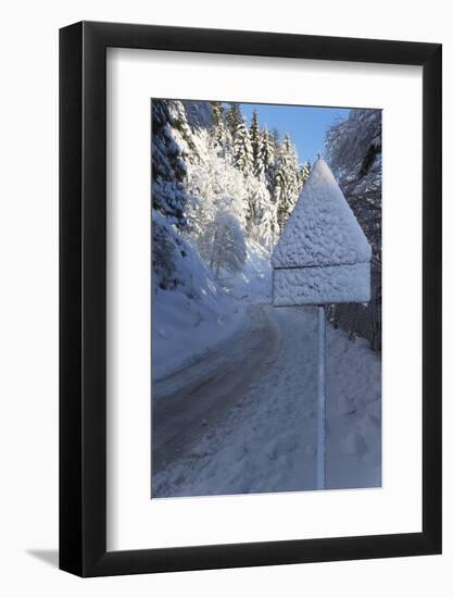 Snow-Covered Road Sign in the Italian Alps in Winter, Aosta Valley, Italy, Europe-Angelo-Framed Photographic Print