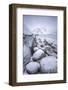Snow covered rocks on the beach modeled by the wind surround the icy sea Pollen Vareid Flakstad Lof-ClickAlps-Framed Photographic Print