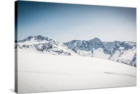 Snow Covered Slope with Mountain Ridge in the Back-Anze Bizjan-Stretched Canvas