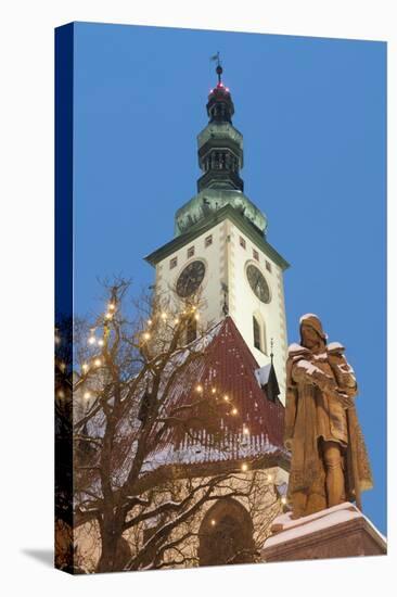 Snow-Covered Statue of Jan Zizka and Church of Transfiguration of Our Lady on Mount Tabor-Richard Nebesky-Stretched Canvas