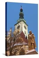 Snow-Covered Statue of Jan Zizka and Church of Transfiguration of Our Lady on Mount Tabor-Richard Nebesky-Stretched Canvas