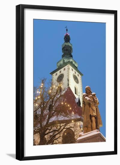 Snow-Covered Statue of Jan Zizka and Church of Transfiguration of Our Lady on Mount Tabor-Richard Nebesky-Framed Photographic Print