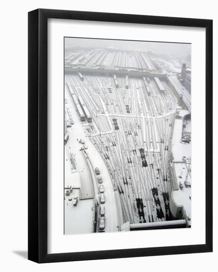 Snow Covers the Railroad Tracks at the Westside Railyard as Snow Falls on New York-null-Framed Photographic Print