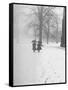 Snow Falling While People Take a Stroll Across Campus of Winchester College-Cornell Capa-Framed Stretched Canvas