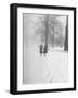 Snow Falling While People Take a Stroll Across Campus of Winchester College-Cornell Capa-Framed Premium Photographic Print