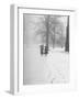 Snow Falling While People Take a Stroll Across Campus of Winchester College-Cornell Capa-Framed Premium Photographic Print